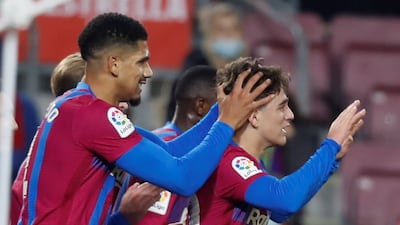 Gavi (R) celebrates after adding the second. EPA