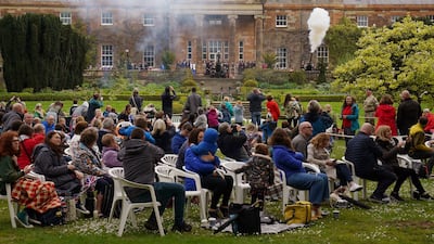 Watching a 21-round salute being fired at Hillsborough Castle, near Belfast. PA