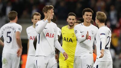 Tottenham players celebrate their 3-1 win over Real Madrid at Wembley. Matt Dunham / AP Photo