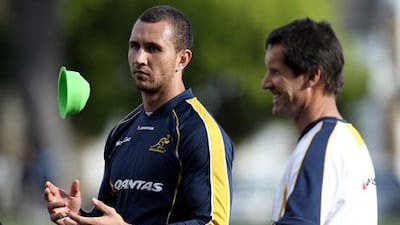 Quade Cooper with Australia coach Robbie Deans.