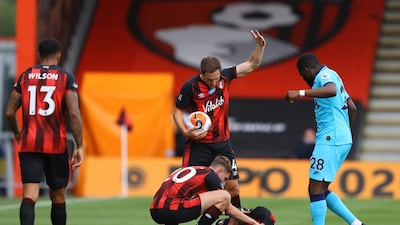 Dan Gosling - 7: Provided protection for his back four and made a crucial tackle on Moura as he was about to pull the trigger. AFP