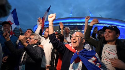 France supporters celebrate Les Bleus 1-0 victory over Belgium during the semi-finals of the Football World Cup. AFP
