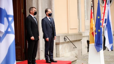 German Foreign Minister Heiko Maas stands at the entrance with Sheikh Abdullah bin Zayed before their meeting with Israeli counterpart Gabi Ashkenazi at Villa Borsig in Berlin, Germany. Reuters