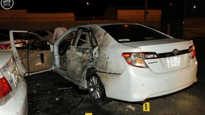 A damaged car is seen after a blast near the US consulate in Saudi Arabia’s second city of Jeddah on July 4, 2016. Saudi Press Agency via Reuters