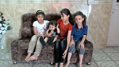 Mohammed Jassem and his family fled Fallujah when ISIL captured the city in 2014. From left, his children Shaded, 11, Abdulrahmen, 18 months, Rahma, 10, and Mahmoud, 7 now live with him in the Kurdish resort town of Shaqlawa. Florian Neuhof for The National