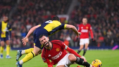 Bruno Fernandes of Manchester United goes down after being challenged Bournemouth's Lewis Cook. Getty Images