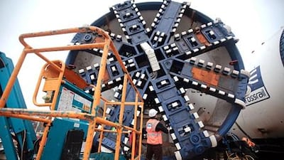 An engineer inspects the cutterhead of a tunnel boring machine in London. Jason Alden / Bloomberg News
