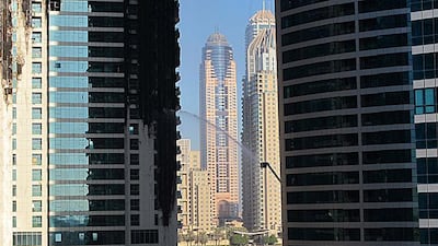 “The fire alarm went off at 2.30am and at first we thought they were just testing the system,� said Ildo Son, 37, from Korea. “Then we looked out of the window and saw lots of fire crews waving for us to come out.� Christopher Ansara for The Natio???