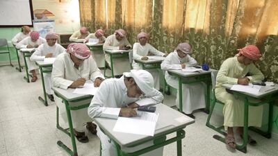 Students in the tenth grade take their year end general studies exam at the Al Rams Secondary School for Boys in Al Rams, Ras Al Khaimah. Jeff Topping / The National