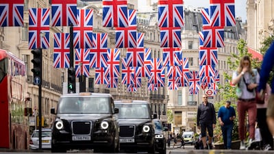 Regent Street in London. The number of overseas visitors to the UK has dropped since VAT exemption ended. The Tories have vowed to reverse the policy. EPA