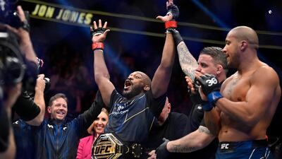Jon Jones, center, celebrates after defeating Ciryl Gane in a UFC 285 mixed martial arts heavyweight title bout Saturday, March 4, 2023, in Las Vegas. (AP Photo / David Becker)