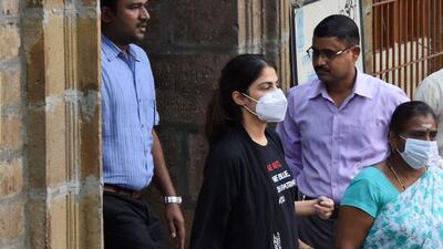Rhea Chakraborty walks out of the Narcotics Control Bureau (NCB) office to be taken for a medical check in Mumbai, India, on September 8. AP