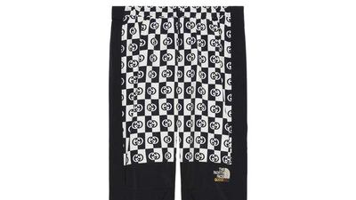 Monogrammed tracksuit bottoms.