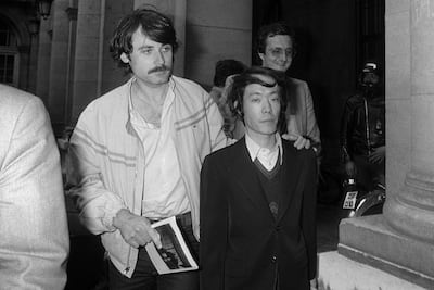 Issei Sagawa leaves Paris police headquarters after questioning in 1981. AFP