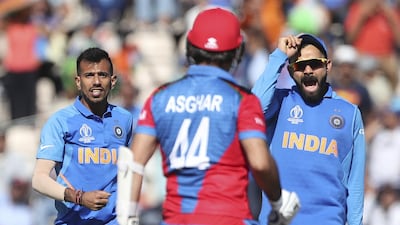 Yuzvendra Chahal (7/10): The right-arm leg-spinner took two wickets and was sharp on the field. Aijaz Rahi / AP Photo