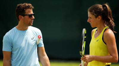 Johanna Konta with coach Wim Fissette during a practice session. Andrew Couldridge / Reuters