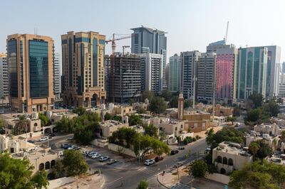 Residential towers surround low rise compounds in the downtown area of Abu Dhabi. Bloomberg