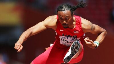 Aries Merritt of the US clears a hurdle in the men's 110m hurdles heats on Wednesday at the Athletics World Championships in Beijing. Srdjan Suki / EPA / August 26, 2015