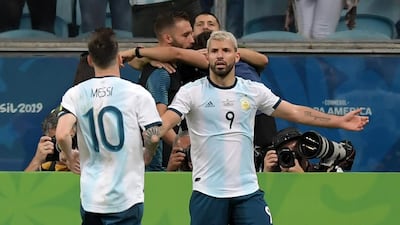 Sergio Aguero celebrates scoring Argentina's second goal with Lionel Messi. AFP