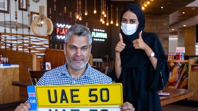 Mohammed Luqman Ali Khan, motoring historian, presents the UAE 50 number plate which has gone up for auction and is expected to break records as it coincides with the country’s 50th anniversary celebrations.