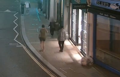Daniel Khalife, left,on his way to collect cash arranged by Adeel Khan. Photo: Met Police