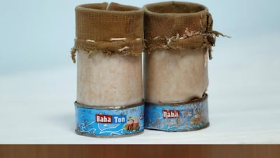 Top, the artificial legs made by Maya's father from tubing and tin cans; bottom, her new artificial limbs. Reuters