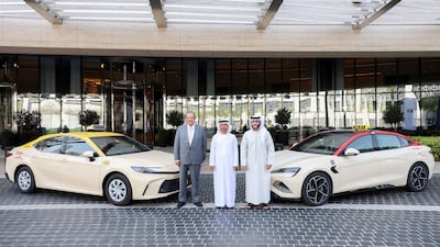 From left, Toufic Mitri, managing director of National Taxi, Abdul Muhsen Kalbat, group chairman of Dubai Taxi Company, and Mansoor Alfalasi, chief executive of Dubai Taxi Company. Photo: DTC