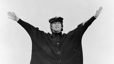 John Lennon poses in March 1965 during a break from shooting 'Help!', the Beatles' second film. Getty