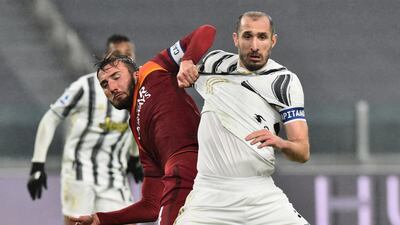 Juventus defender Giorgio Chiellini battlles with Roma's Bryan Cristante. Reuters