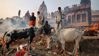 Mourners gather for funeral rites at the Manikarnika Ghat cremation site on the banks of the Ganges in Varanasi, India. AFP
