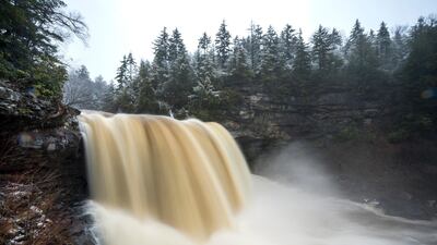 Water cascades over Blackwater Falls during a snowstorm outside Davis, West Virginia, US. The fresh wave of snow moved across the mid-Atlantic states. Jim Lo Scalzo / EPA
