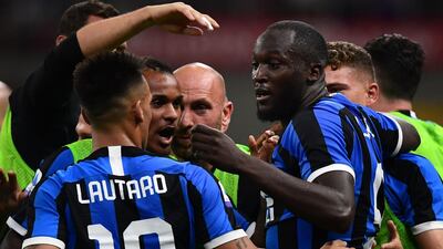 Inter Milan's Belgian forward Romelu Lukaku celebrates with fellow forward Lautaro Martinez. AFP