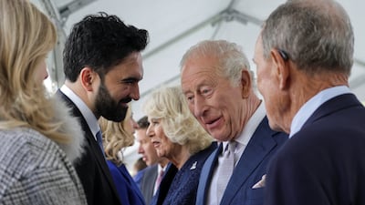 Britain's King Charles, next to Queen Camilla, speaks with New York City Mayor Zohran Mamdani at the 9/11 Memorial on April 29. Reuters