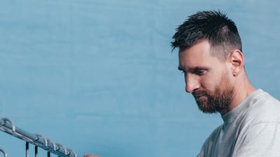 Messi with six of his jerseys from the 2022 World Cup. Photo: Sam Robles Photography