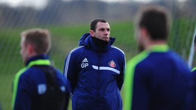 Sunderland manager Gus Poyet looks on during training on February 26, 2014, ahead of the Capital One Cup final against Manchester City. Stu Forster / Getty Images