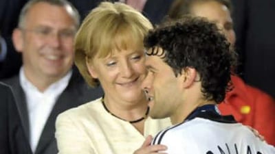 Angela Merkel, the German Chancellor, comforts Michael Ballack after Germany lost the Euro 2008 final in Vienna.