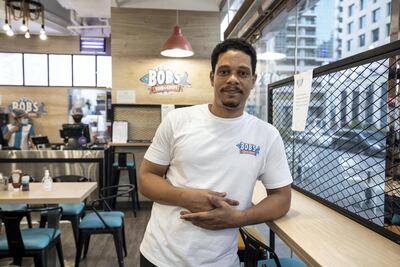 Alvin Flynn went from customer to employee at Bob's Fish and Chips in Dubai Marina. Antonie Robertson / The National