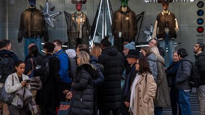 Shoppers queue for a store on Oxford Street in London, England. UK retail sales volumes, excluding fuel, dropped 6.2 per cent year on year in September, according to official data. Getty
