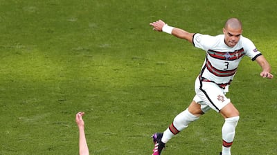 Portugal's Bernardo Silva challenges Andras Schafer of Hungary. EPA