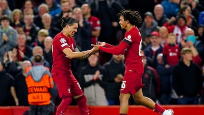 Liverpool's Trent Alexander-Arnold celebrates with team-mate Darwin Nunez after scoring the first goal of the game. PA