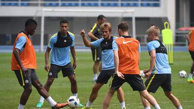 Kelechi Iheanacho, left, and Manchester City teammates take part in a training session a day before the 2016 International Champions Cup football match between Manchester City and Manchester United, in Beijing on July 24, 2016. Greg Baker / AFP /