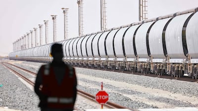 An Etihad Rail train at Al Mirfa. A fully loaded freight train can carry the equivalent cargo of 300 lorries – reducing carbon dioxide emission by up to 80 per cent. AFP
