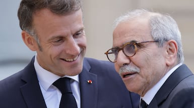 Lebanese Prime Minister Nawaf Salam, right, and France's President Emmanuel Macron said it was important to disarm Hezbollah. AFP
