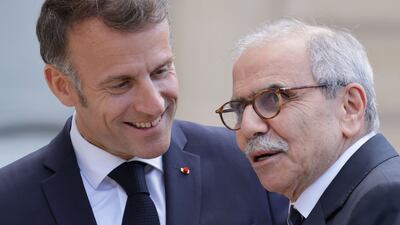 Lebanese Prime Minister Nawaf Salam, right, and France's President Emmanuel Macron said it was important to disarm Hezbollah. AFP