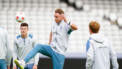 England's Stuart Broad kicks a ball during training. AP