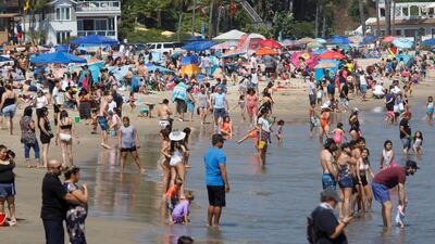 Visitors crowd the beach during the Memorial Day holiday weekend in Newport Beach, California, USA. EPA