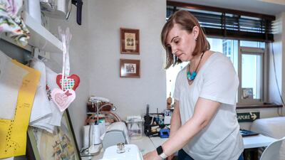 The simple mittens can protect burnt paws while they heal. Victor Besa / The National