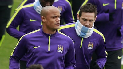 Vincent Kompany and Manchester City trail Chelsea by six points in the Premier League title race. Jason Cairnduff / Reuters / March 17, 2015