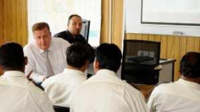 Tawasul's general manager Abdullah Kassab meets with driver representatives yesterday.