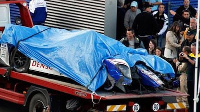 Anthony Davidson's car is returned to the pits after a mid-air flip at Le Mans